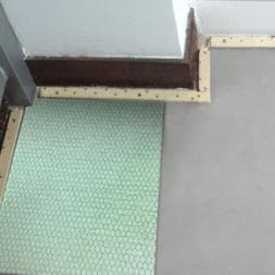 Lay the carpet underlay in the groove of the tack strip