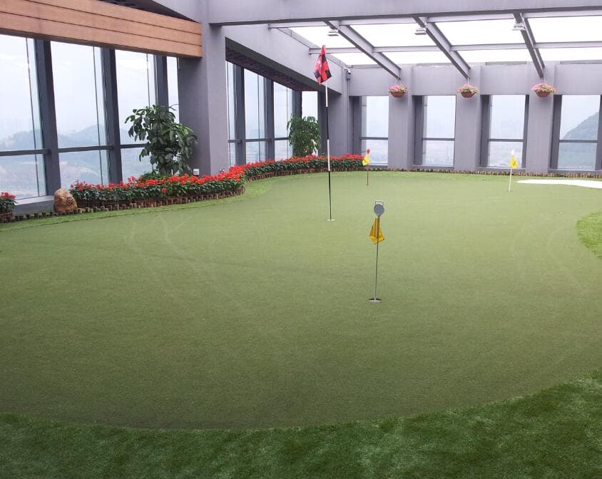 Artificial grass in indoor golf green